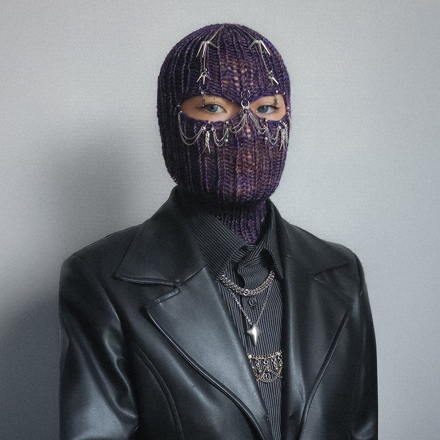 Spiky purple knitted balaclava