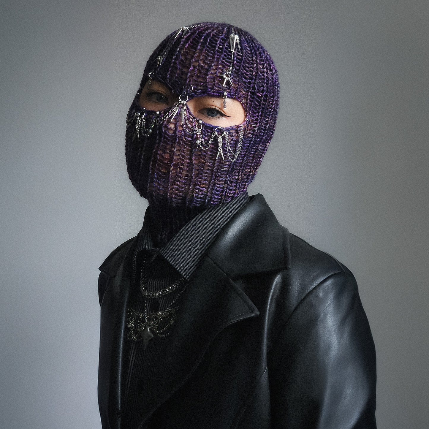 Spiky purple knitted balaclava