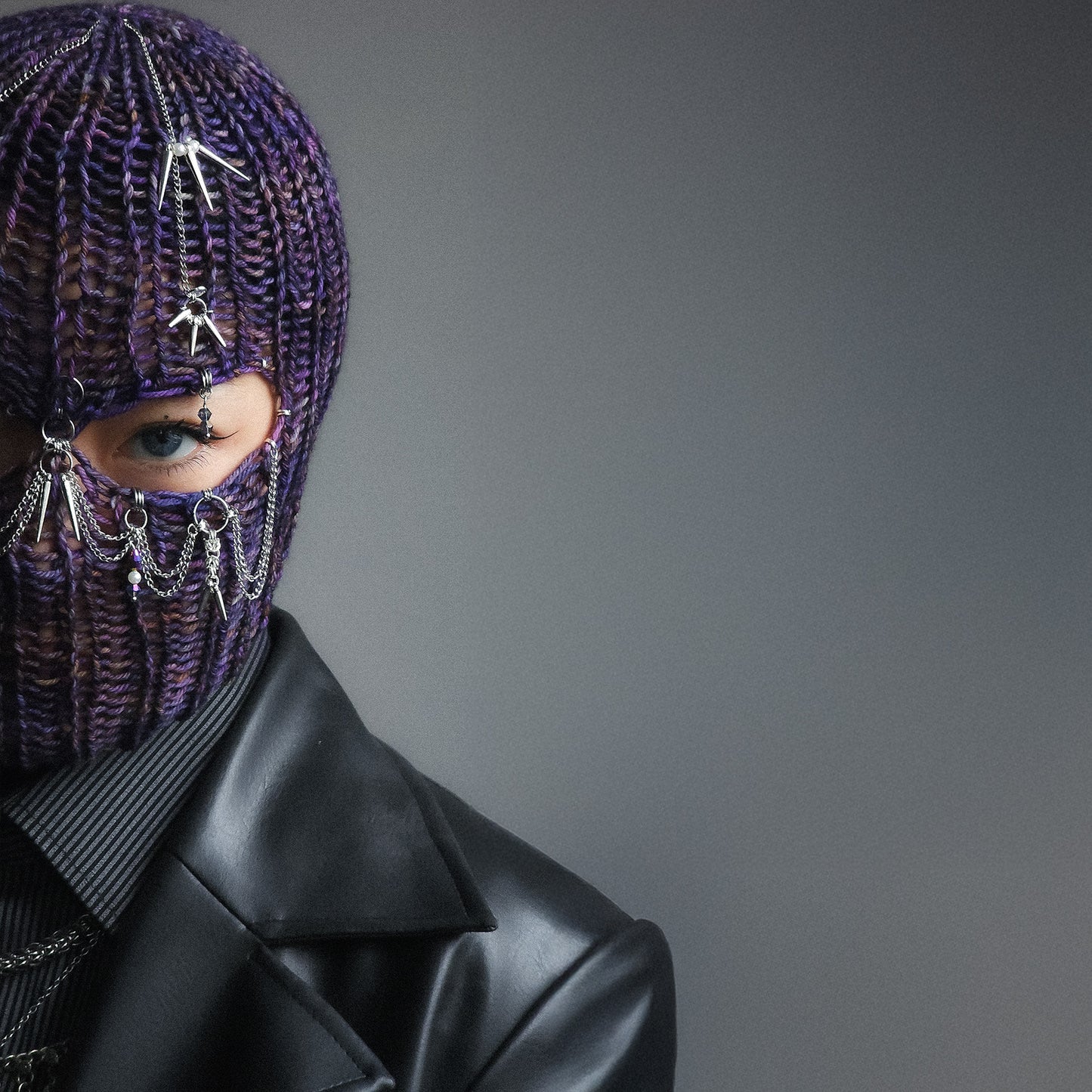 Spiky purple knitted balaclava