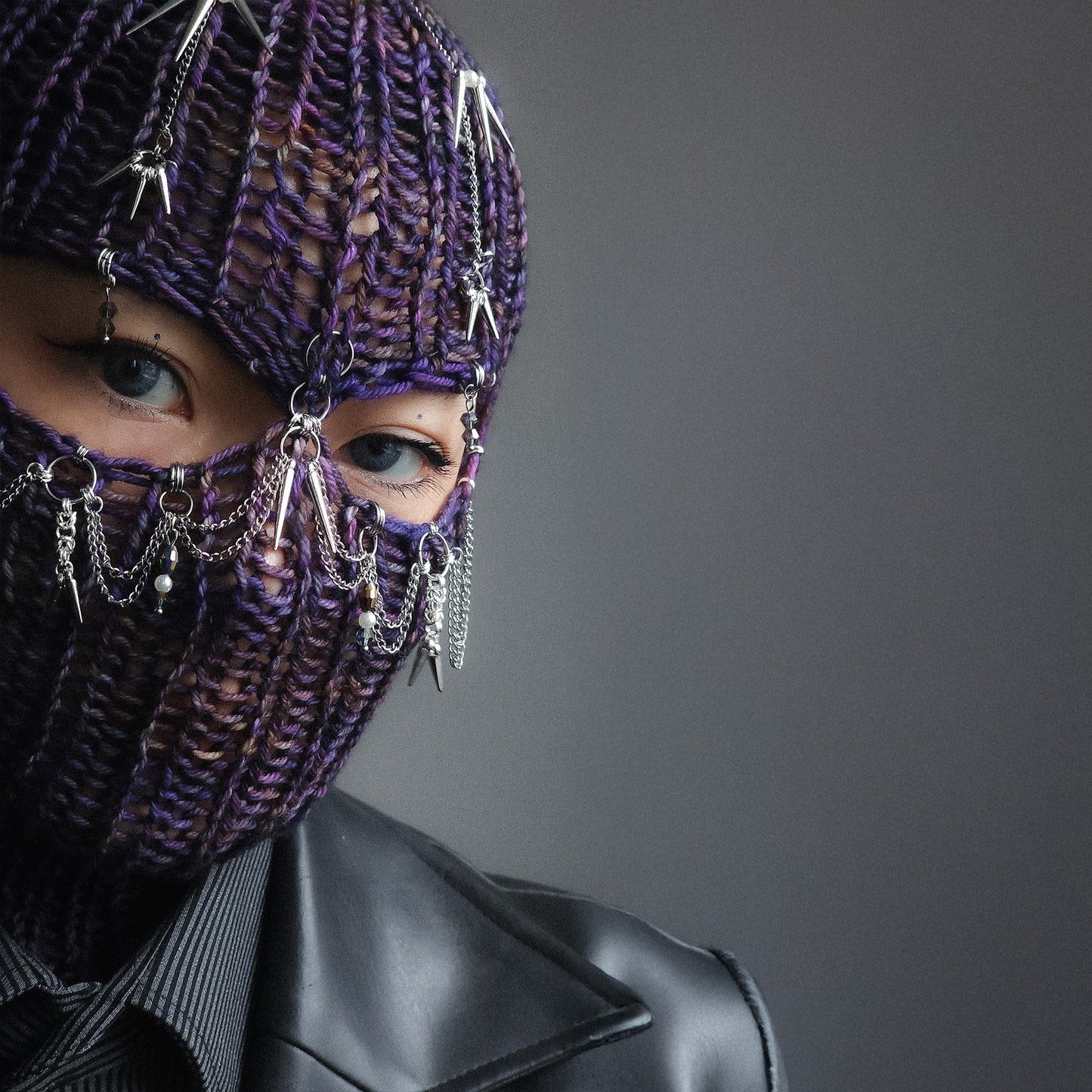 Spiky purple knitted balaclava
